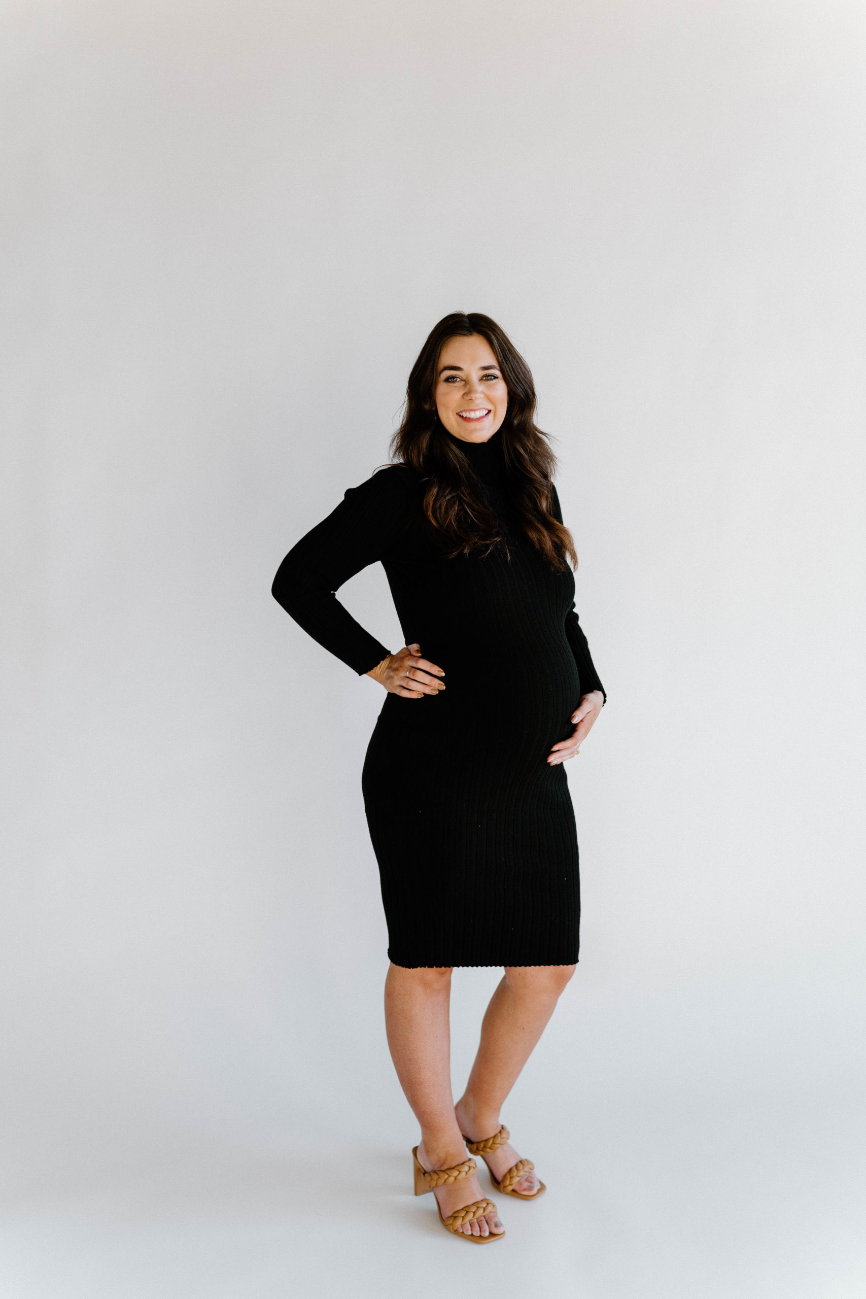 Maternity session of mom in black dress