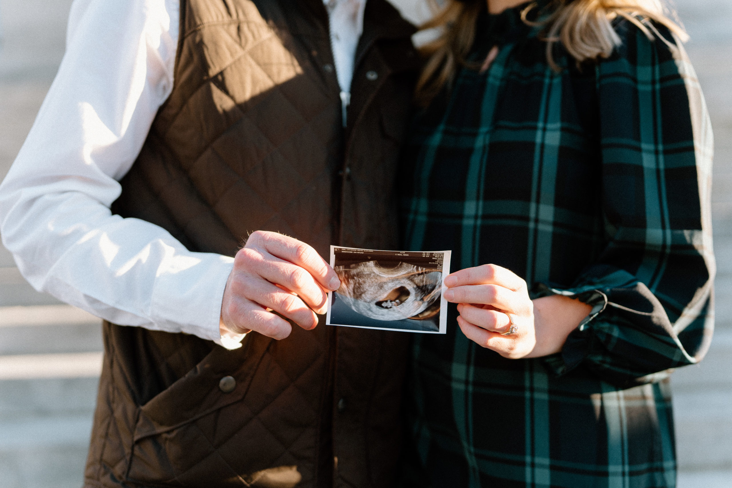Couple holding ultrasound 