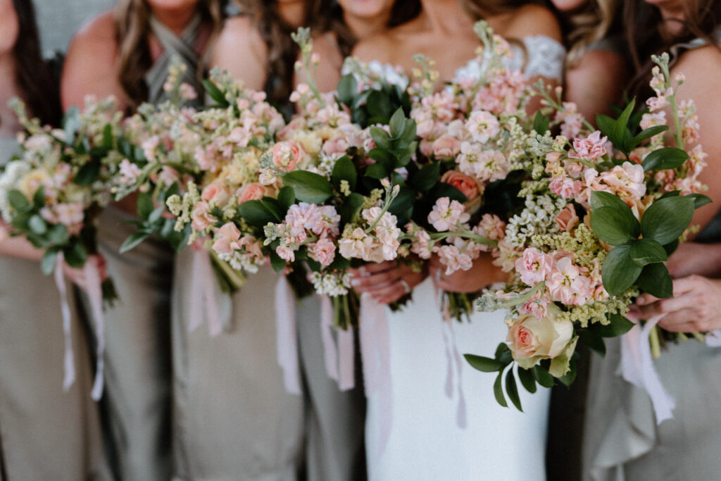 Bridal party holding flowers